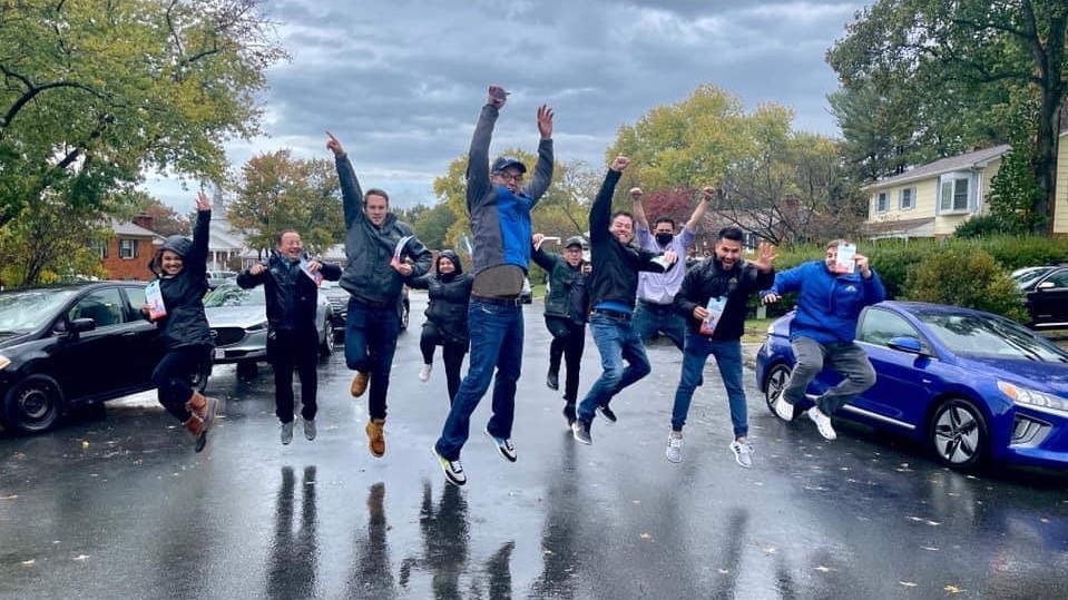 LIBRE staff in Virginia celebrate after a long day of canvassing in the Virginia gubernatorial election. 